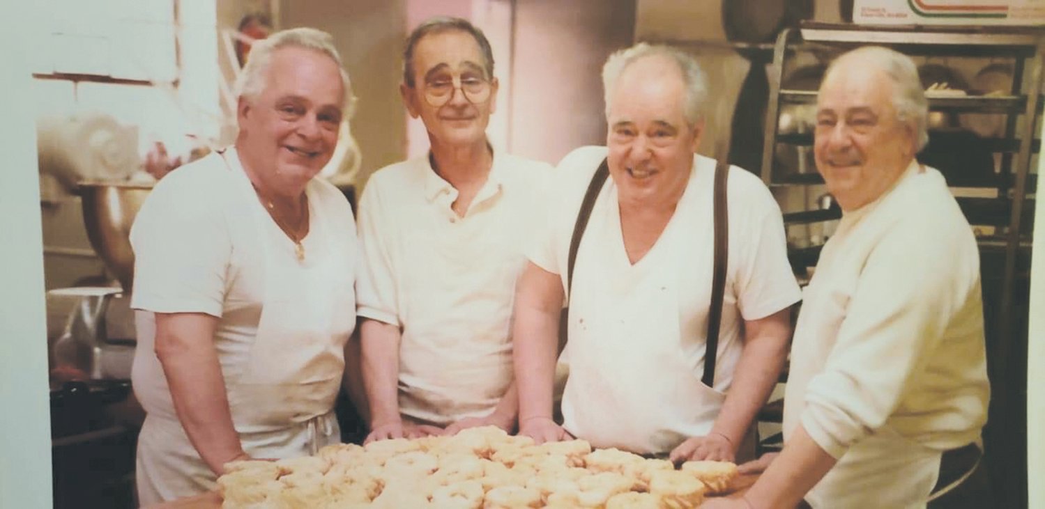 FOUNDING BROTHERS: From left to right, Michael Solitro Jr. stands with his brothers George, Armando and Larry. The founders of Solitro’s Bakery in Cranston have all passed away, but their relatives have kept the family business alive.